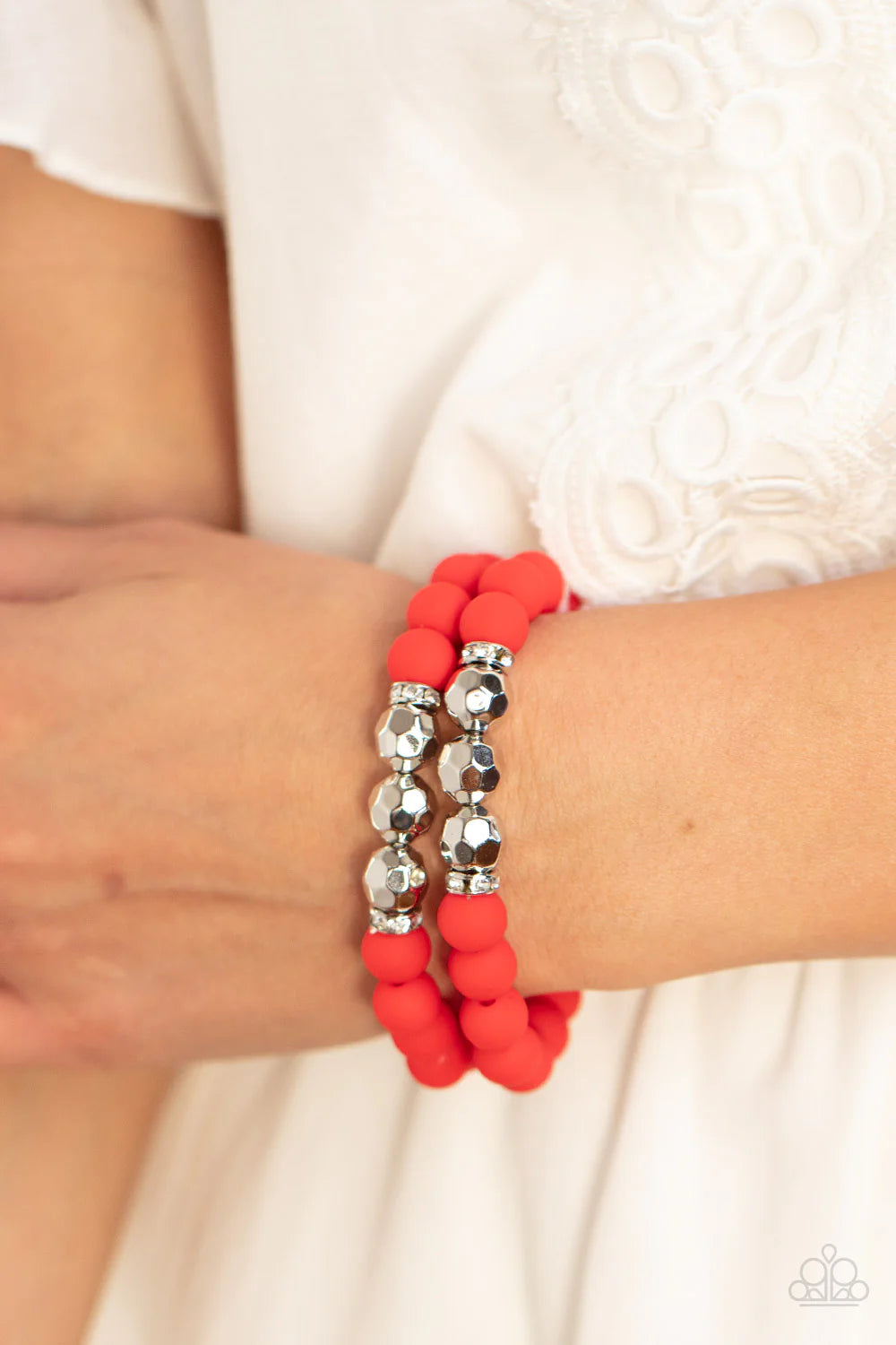 Paparazzi Accessories Dip and Dive - Red White rhinestone encrusted rings flank a trio of faceted silver beads along a stretchy row of matte-finished Poinciana beads, creating a summery splash of color around the wrist. Sold as one individual bracelet. Je