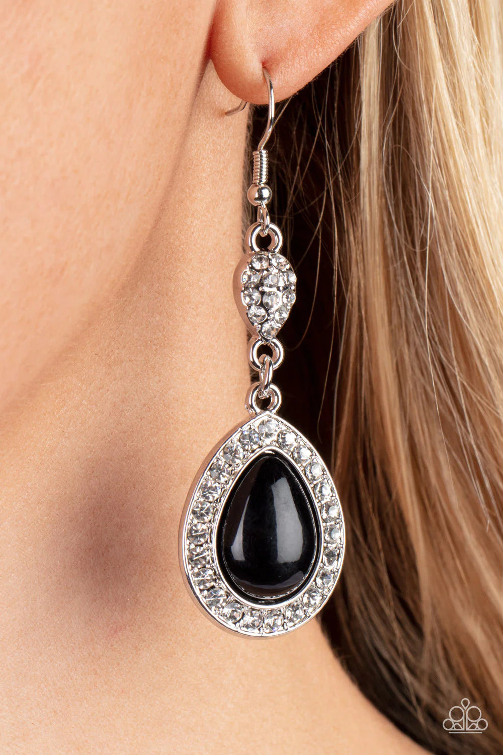 Paparazzi Accessories Elite Elegance - Black Bordered in glassy white rhinestones, an oversized black teardrop bead swings from the bottom of a dainty silver teardrop that is encrusted in glassy white rhinestones, resulting in a radiant lure. Earring atta