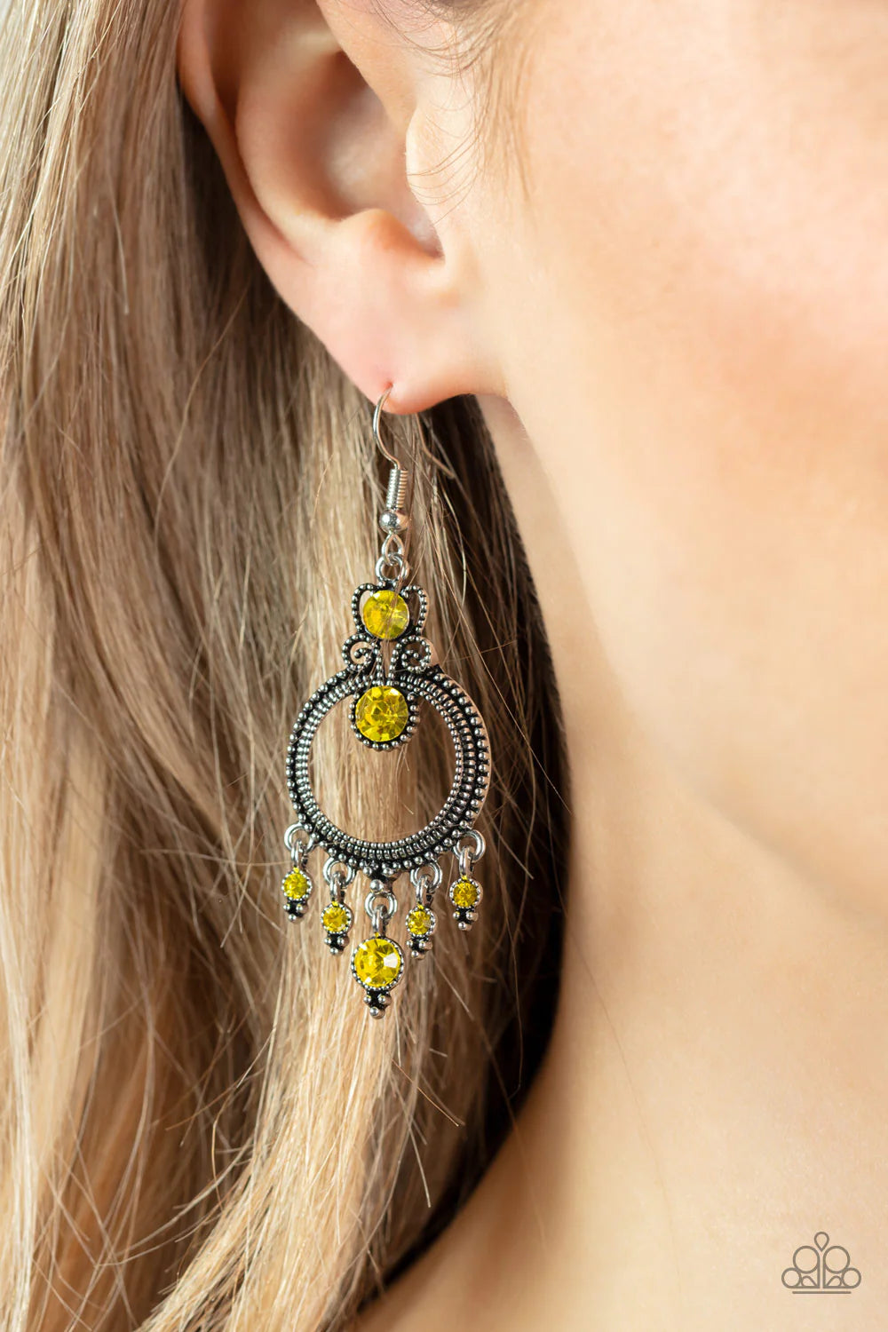 Paparazzi Accessories Palace Politics - Yellow Sparkling with a pair of brilliant yellow rhinestones, a studded filigree accent attaches to the top of a studded silver hoop brimming with antiqued textures. A dainty collection of yellow rhinestones twinkle