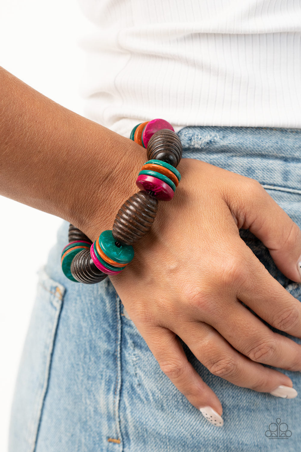 Paparazzi Accessories Caribbean Castaway - Multi A summery collection of oversized brown wooden beads and distressed multicolored wooden discs are delicately threaded along stretchy bands around the wrist for a beach inspired fashion. Sold as one individu