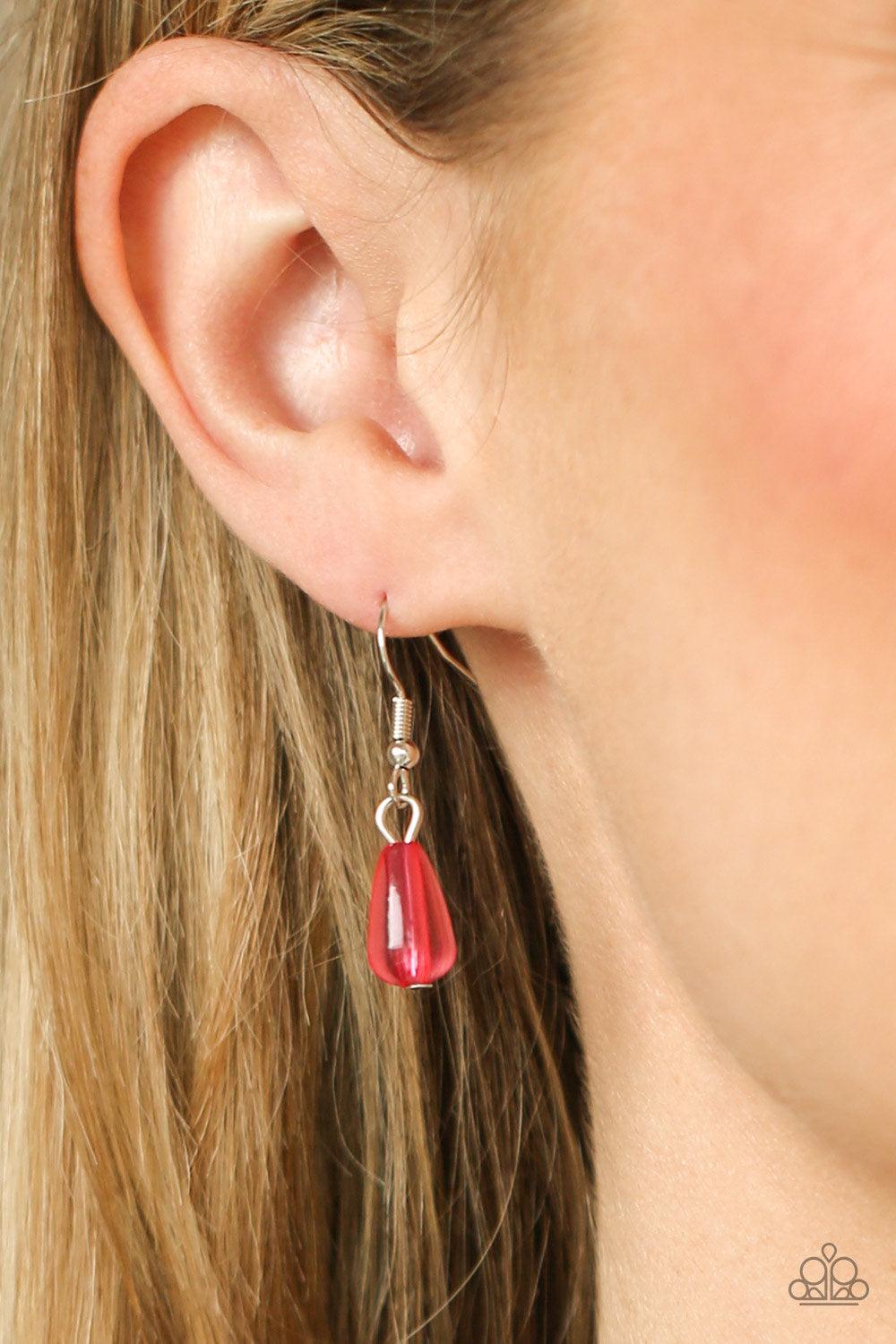 Paparazzi Accessories Midsummer Mixer - Pink Varying in opacity, a vivacious collection of pink oval and teardrop acrylic and crystal-like beads cascade from two bold silver chains below the collar for a flirtatiously layered look. Features an adjustable