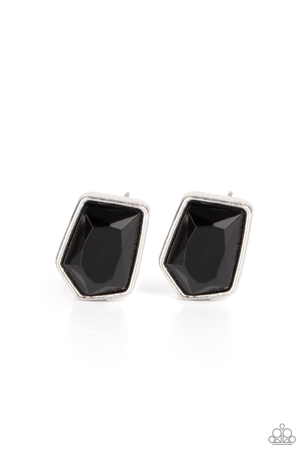 Paparazzi Accessories Indulge Me - Black Featuring a raw asymmetrical cut, a glittery black gem is encased inside a sleek silver frame, creating an edgy display. Earring attaches to a standard post fitting. Sold as one pair of post earrings. Jewelry