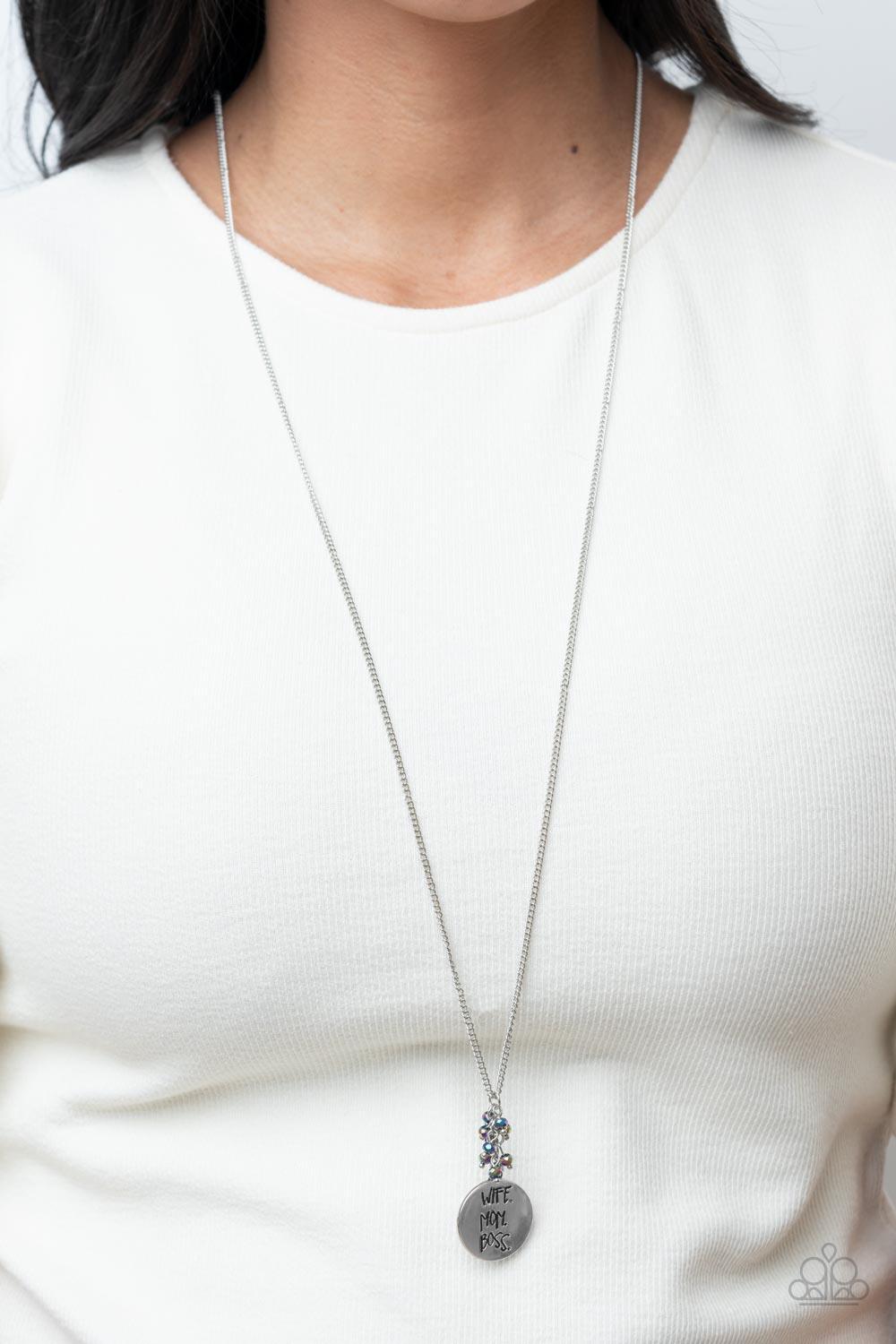 Paparazzi Accessories Words To Live By - Multi A silver disc inscribed with the words, "Wife. Mom. Boss." creates a stylish namesake as it falls from a lengthened silver chain. A sprinkle of dainty iridescent oil spill beads adds a decorative fringe atop