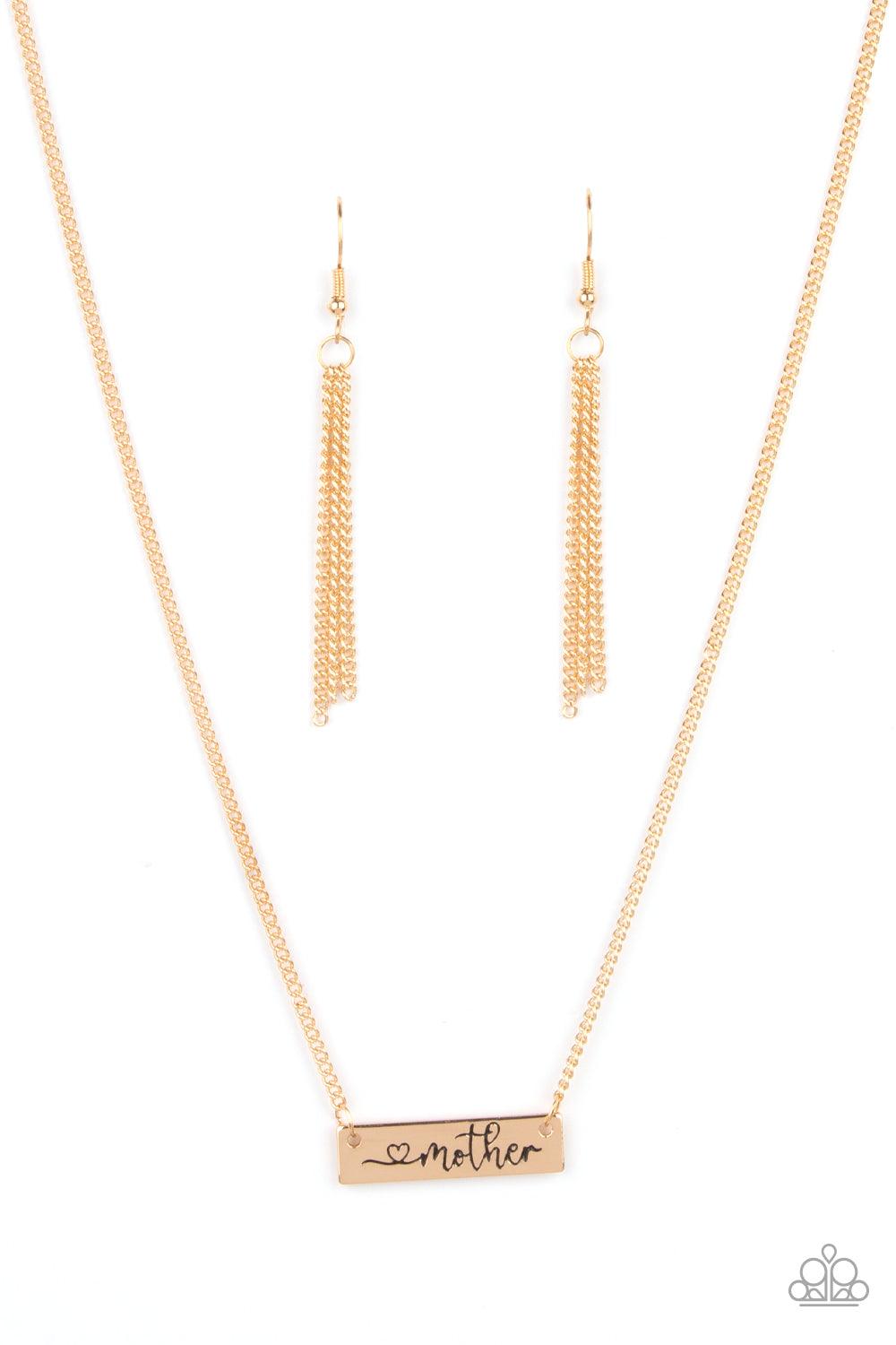Paparazzi Accessories Joy Of Motherhood - Gold Stamped in a heart and the word, "Mother," a glistening gold plate is suspended by a classic gold chain below the collar, creating a whimsy sentimental pendant. Features an adjustable clasp closure. Sold as o