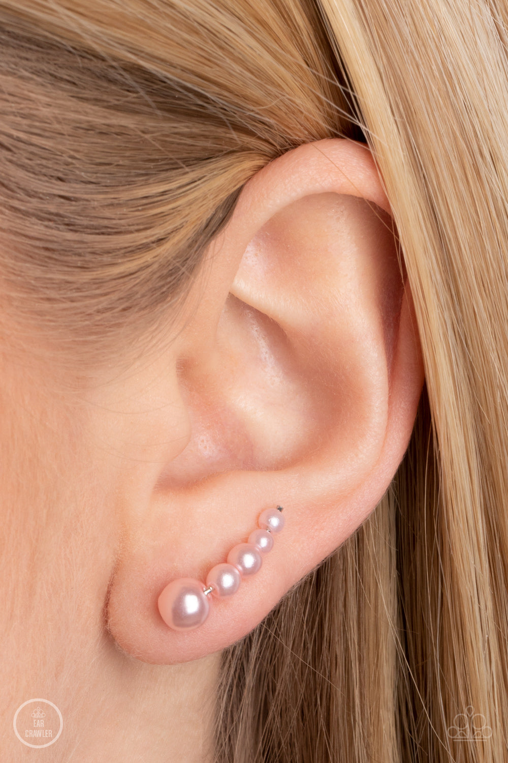Paparazzi Accessories Dropping into Divine - Pink A bubbly cluster of dainty pink pearls decrease in size as they climb the ear, curving into an effervescent accent. Features an extended post fitting that climbs the back of the ear and can be pressed toge