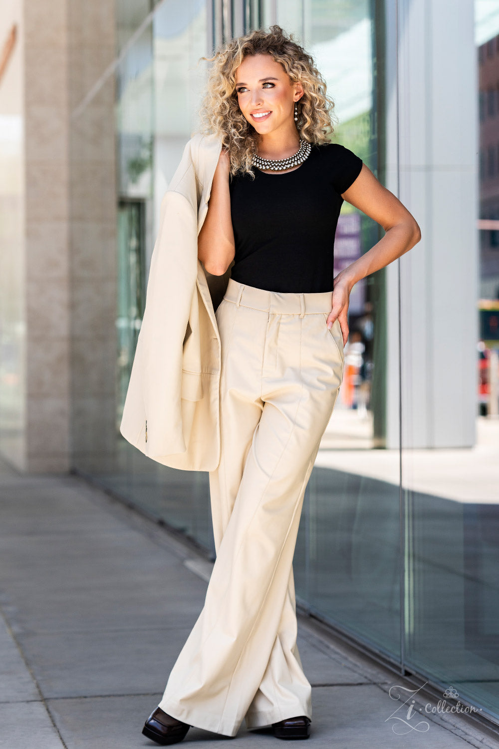 Paparazzi Accessories Undeniable Thin bars of brass, etched in rugged linear texture and dotted with tiny brass studs, are topped by brilliant white rhinestones encased in pronged fittings. The bars are threaded along wires and separated by tiny brass bea