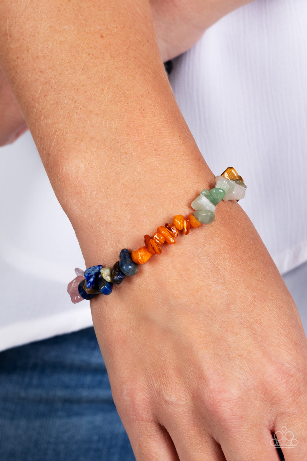 Paparazzi Accessories Pebbled Plains - Multi An earthy collection of turquoise, lapis, jade, amethyst, Tiger's eye, orange, gray, and pink pebbles are threaded along a stretchy band around the wrist for a Southwestern finish. Sold as one individual bracel
