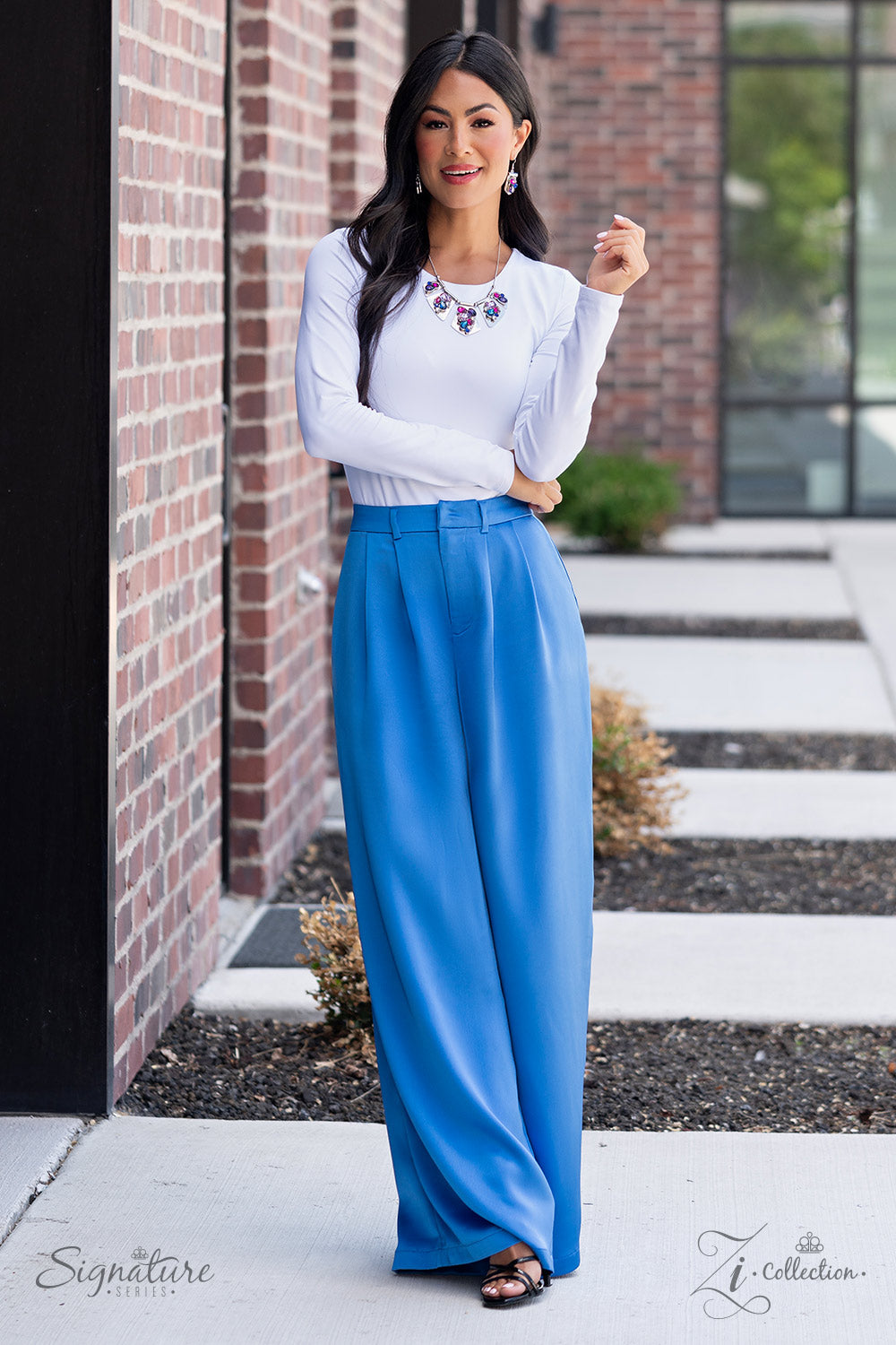 Paparazzi Accessories The Laura Shimmery silver plates slide along a skinny snake chain, with sleek metallic beads separating each one. Clusters of faceted gems are haphazardly staggered across the surface of each silver canvas, emitting a treasure trove