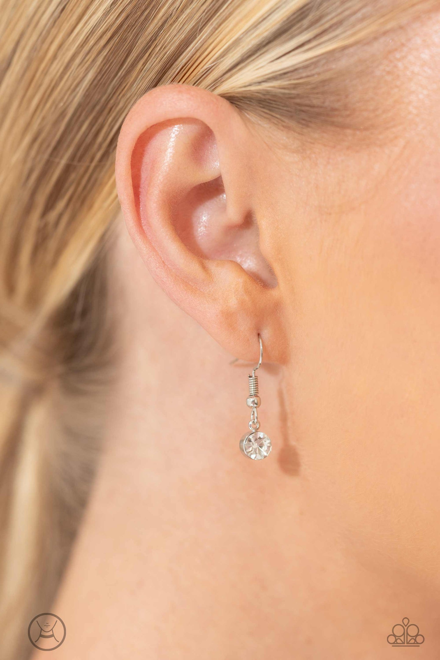 Paparazzi Accessories Glistening Gallery - White Featuring pronged silver fittings, strands of oversized, glittery white rhinestones connect with rows of silver box chains around the neck for a glittery twist. Features an adjustable clasp closure. Sold as