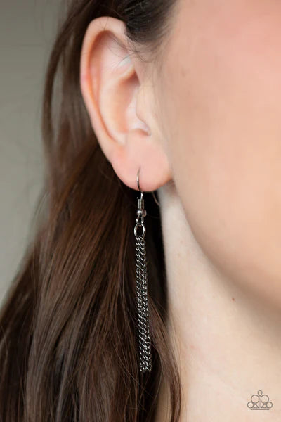Paparazzi Accessories Artificial Arches - Black A strand of shiny gunmetal beads give way to bowing gold and gunmetal frames, creating an edgy pendant below the collar. Features an adjustable clasp closure. Sold as one individual necklace. Includes one pa