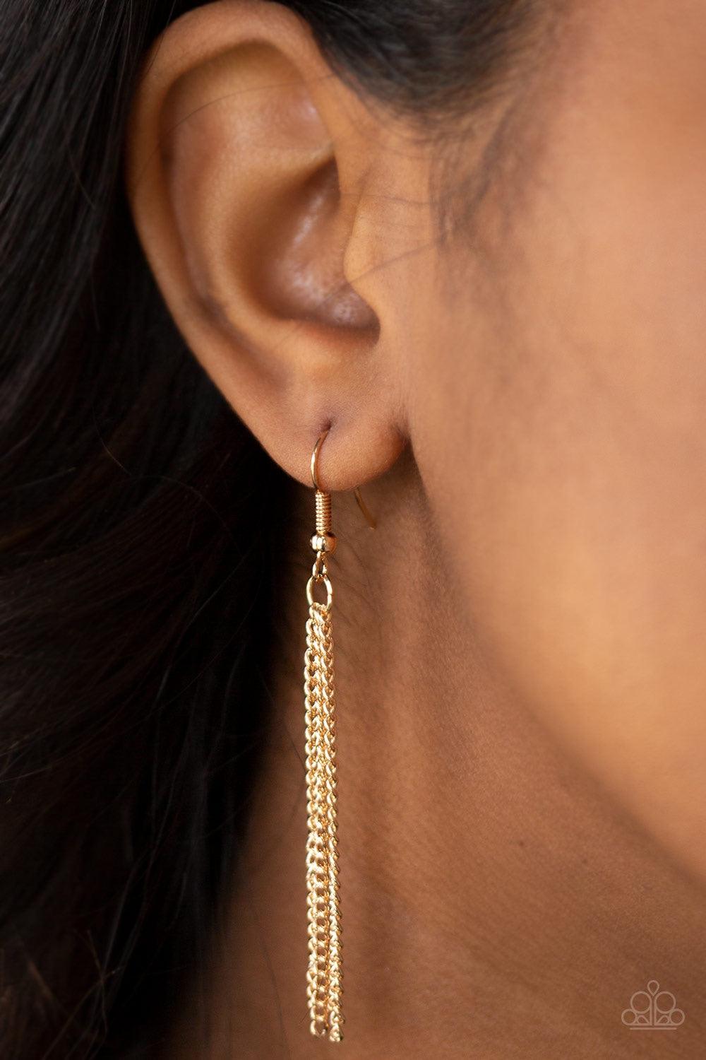 Paparazzi Accessories The Keynoter - Gold A mismatched pair of gold keys swing from the bottom of a shimmery gold chain, creating an edgy pendant. Features an adjustable clasp closure. Jewelry