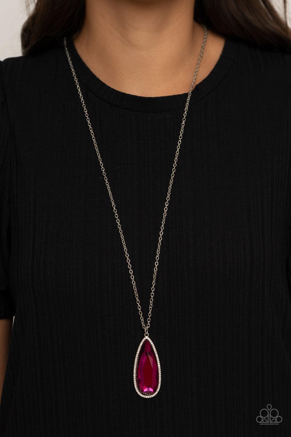Paparazzi Accessories Watch Out For REIGN - Pink Bordered in a white rhinestone encrusted frame, an oversized Pink Peacock teardrop swings from the bottom of a lengthened silver chain, creating a regal pendant. Features an adjustable clasp closure. Sold a