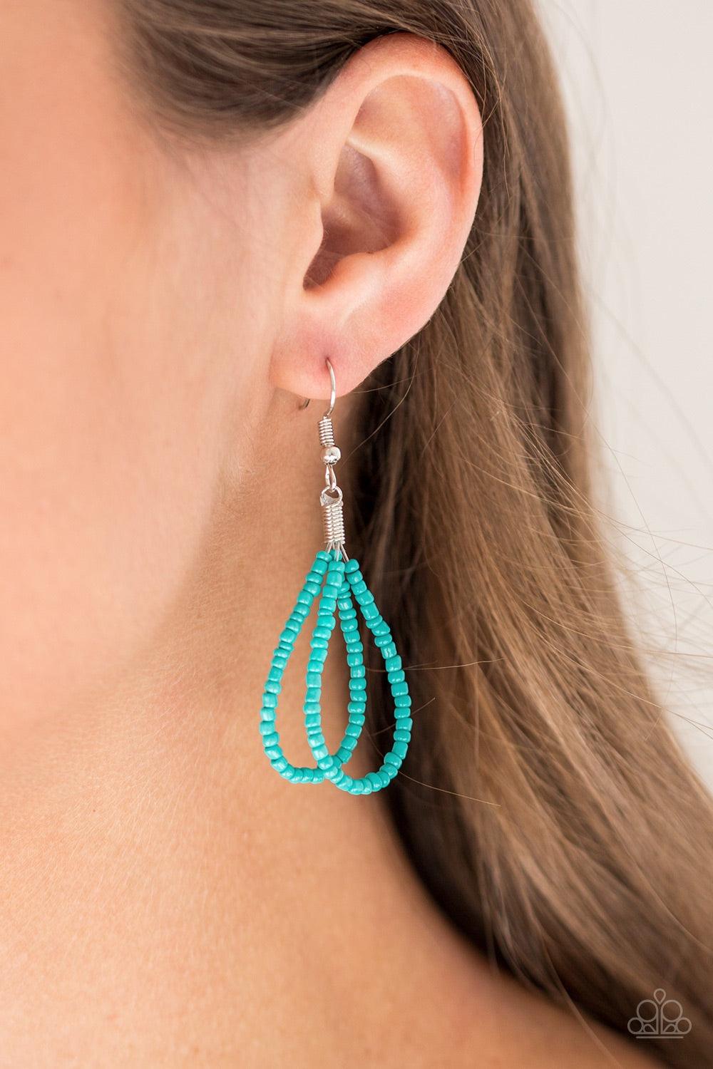Paparazzi Accessories Savannah Surfin - Blue Glistening silver beads give way to strands of twisting turquoise seed beads below the collar for a summery flair. Features an adjustable clasp closure. Jewelry