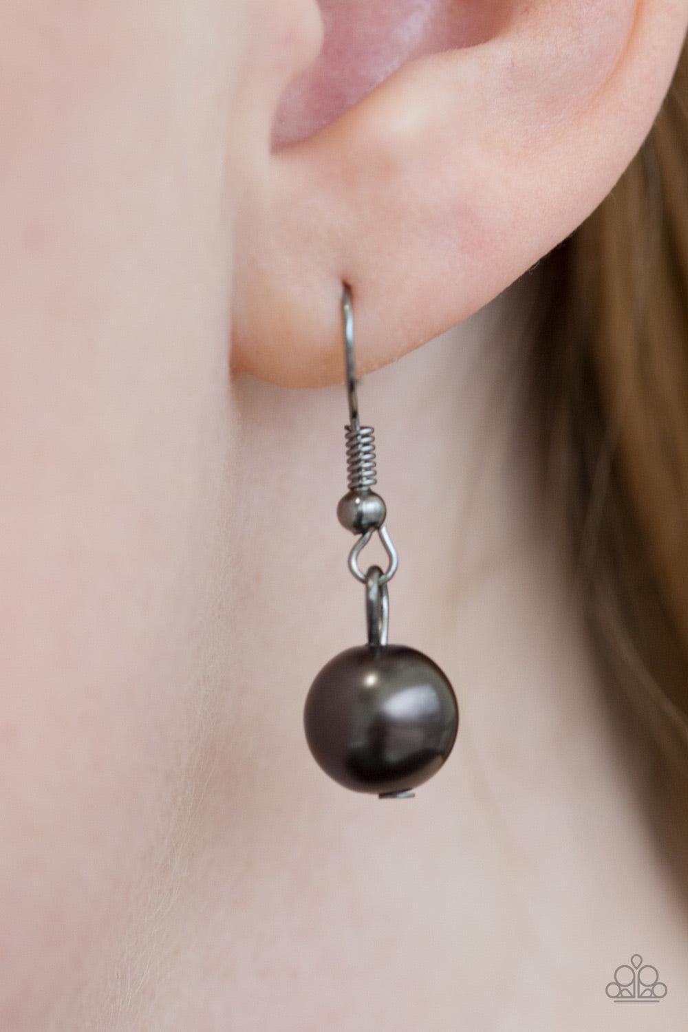 Paparazzi Accessories STUN Control - Black Pearly gunmetal beads trickle along strands of glistening gunmetal chains, creating a tapered fringe below the collar. Features an adjustable clasp closure. Jewelry