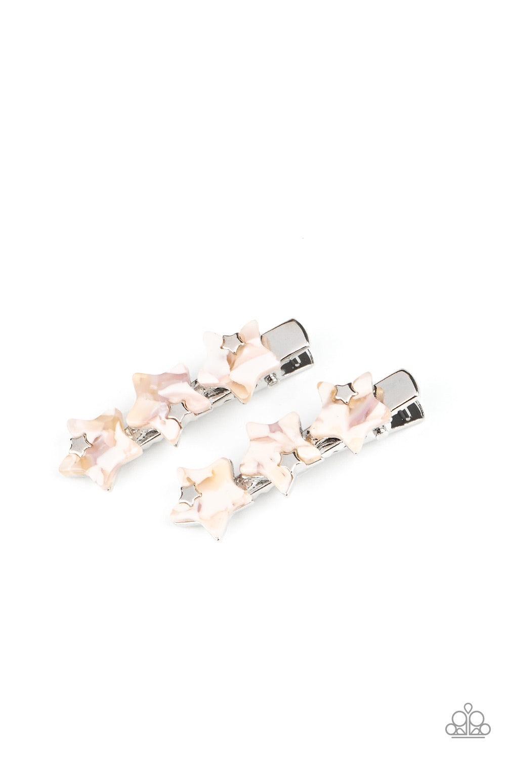 Paparazzi Accessories Brightest Star In The Sky - Multi Dotted with dainty silver star charms, trios of Peach Nougat acrylic stars coalesce into a pair of colorful frames. Features standard hair clips on the back. Sold as one pair of hair clips. Hair Acce