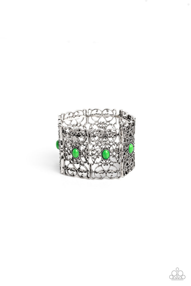 Paparazzi Accessories Fairest Filigree - Green Shiny green beads, set in vertical, rectangular frames of swirling silver filigree are infused along stretchy bands for a whimsically wild fashion around the wrist. Sold as one individual bracelet. Jewelry