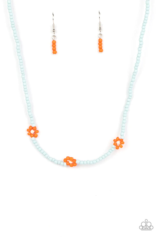 Paparazzi Accessories Bewitching Beading - Orange Strung along the entirety of an invisible wire, light blue seed beads coalesce around the collar. The row of blue seed beads are haphazardly interrupted by blooming orange seed bead flowers, with baby pink