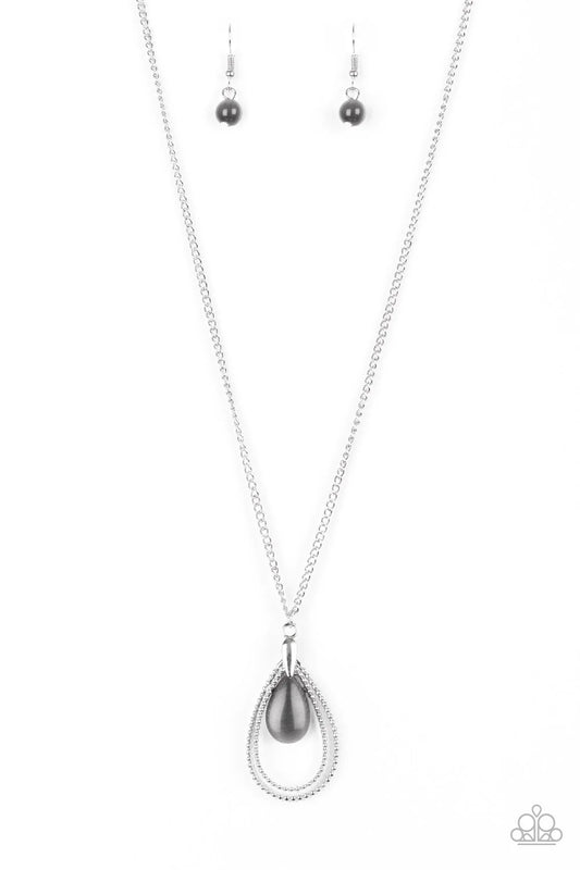Paparazzi Accessories Teardrop Tranquility - Black Studded silver teardrops swing from the bottom of a shimmery silver chain. A glowing black moonstone attaches to the innermost frame, creating a whimsical pendant. Features an adjustable clasp closure. So