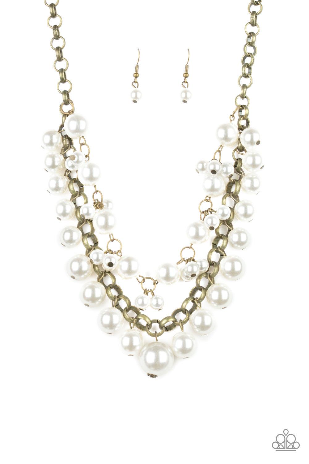 Paparazzi Accessories BALLROOM Service - Brass Two rows of mismatched white pearls gorgeously drape below the collar. Featuring oversized brass links and an assortment of pearl sizes, the bubbly strands layer into a dramatic fringe for a modern timelessne