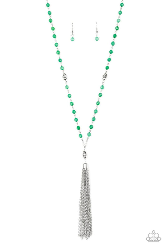 Paparazzi Accessories Tassel Takeover - Green Green opaque crystal-like beads, shiny silver beads, and white rhinestone encrusted rings give way to a shimmery silver tassel for a whimsical look. Features an adjustable clasp closure. Sold as one individual
