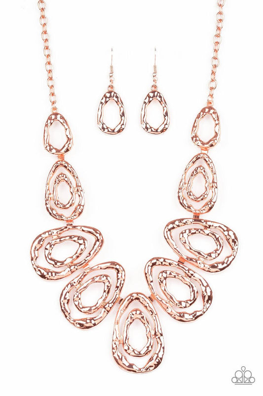 Paparazzi Accessories Terra Couture - Copper Delicately hammered in blinding shimmer, shiny copper bars spin into asymmetrical teardrops. The airy abstract frames link into a bold industrial statement piece below the collar. Features an adjustable clasp c
