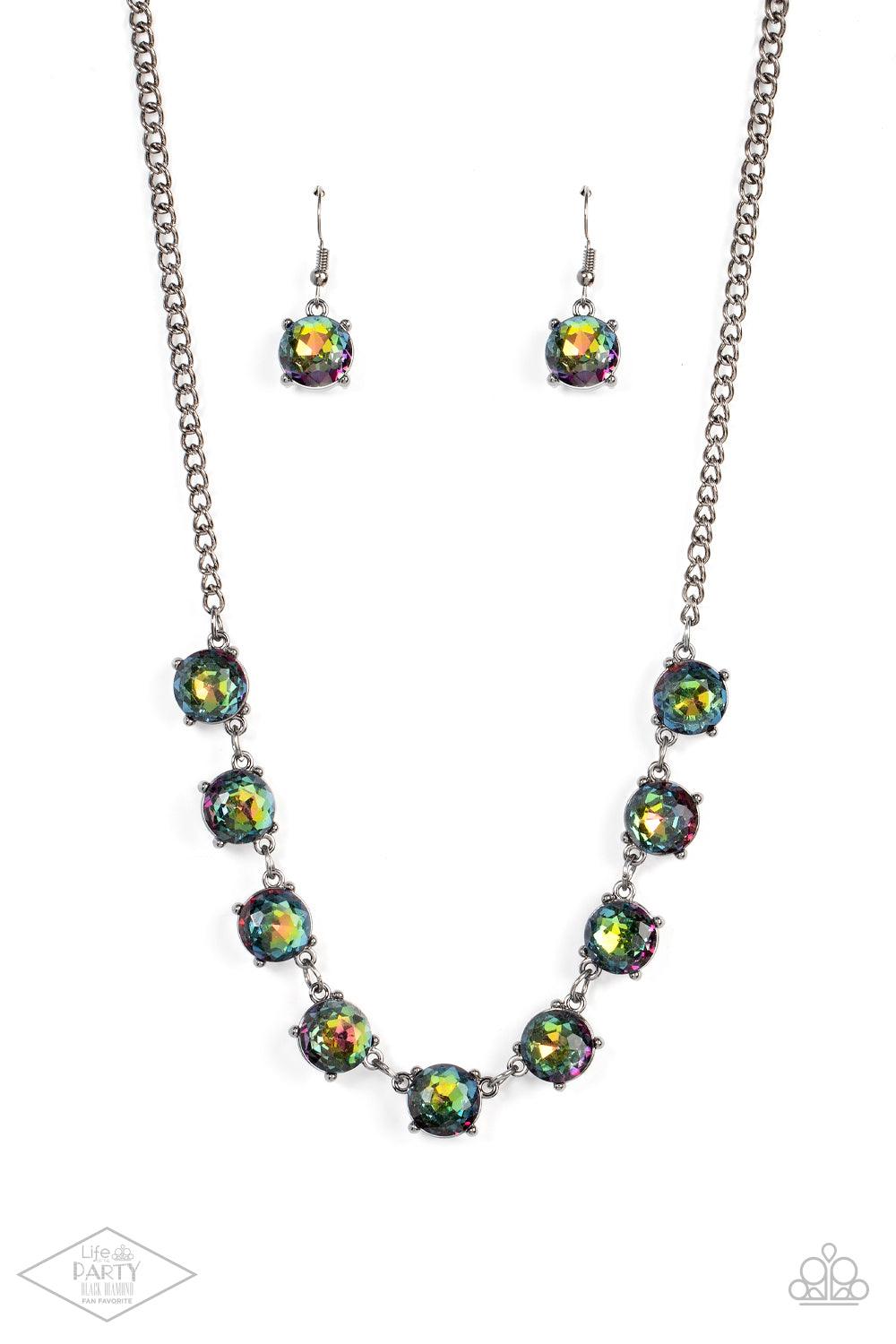 Paparazzi Accessories Iridescent Icing - Multi Featuring oil spill centers and sleek gunmetal fittings, a collection of oversized rhinestones link below the collar for an icy look. Features an adjustable clasp closure. Sold as one individual necklace. Inc