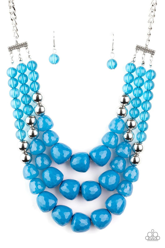 Paparazzi Accessories Forbidden Fruit - Blue Varying in shape and opacity, a collection of round and asymmetrical Mosaic Blue beads are threaded along invisible wires below the collar. Shiny silver beads sprinkled along the strands, adding hints of shimme