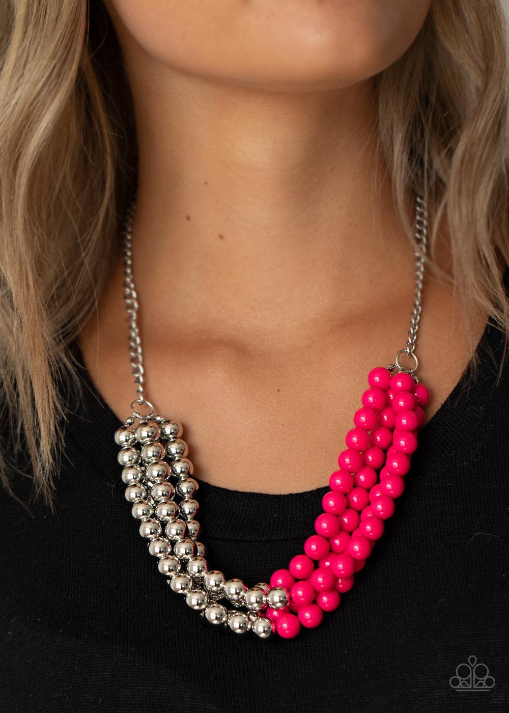 Paparazzi Accessories Layer After Layer - Pink Featuring half silver and half pink beads, a colorful collision of beads layer below the collar for a powerful pop of color. Features an adjustable clasp closure. Sold as one individual necklace. Includes one
