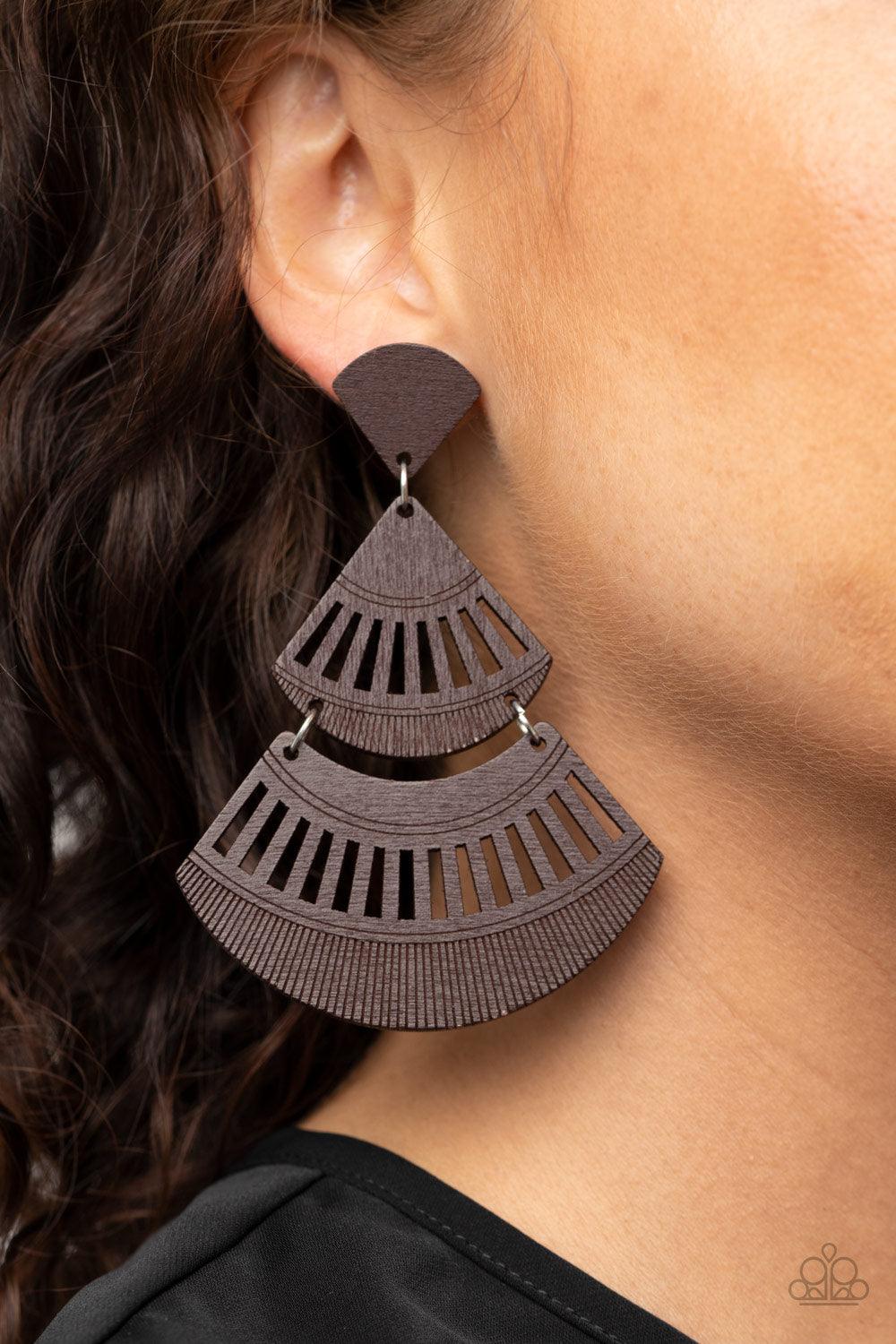 Paparazzi Accessories Oriental Oasis - Brown Stenciled in airy cutout details, an earthy collection of triangular and crescent-shaped wooden frames delicately connect into a fanned out lure. Earring attaches to a standard post fitting. Sold as one pair of
