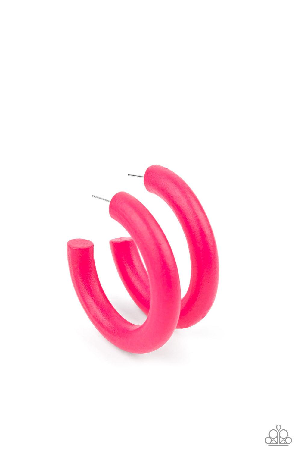 Paparazzi Accessories Woodsy Wonder - Pink Painted in a flamboyant Pink Peacock finish, a thick wood hoop curls around the ear for a flirtatiously colorful look. Earring attaches to a standard post fitting. Hoop measures approximately 2" in diameter. Sold