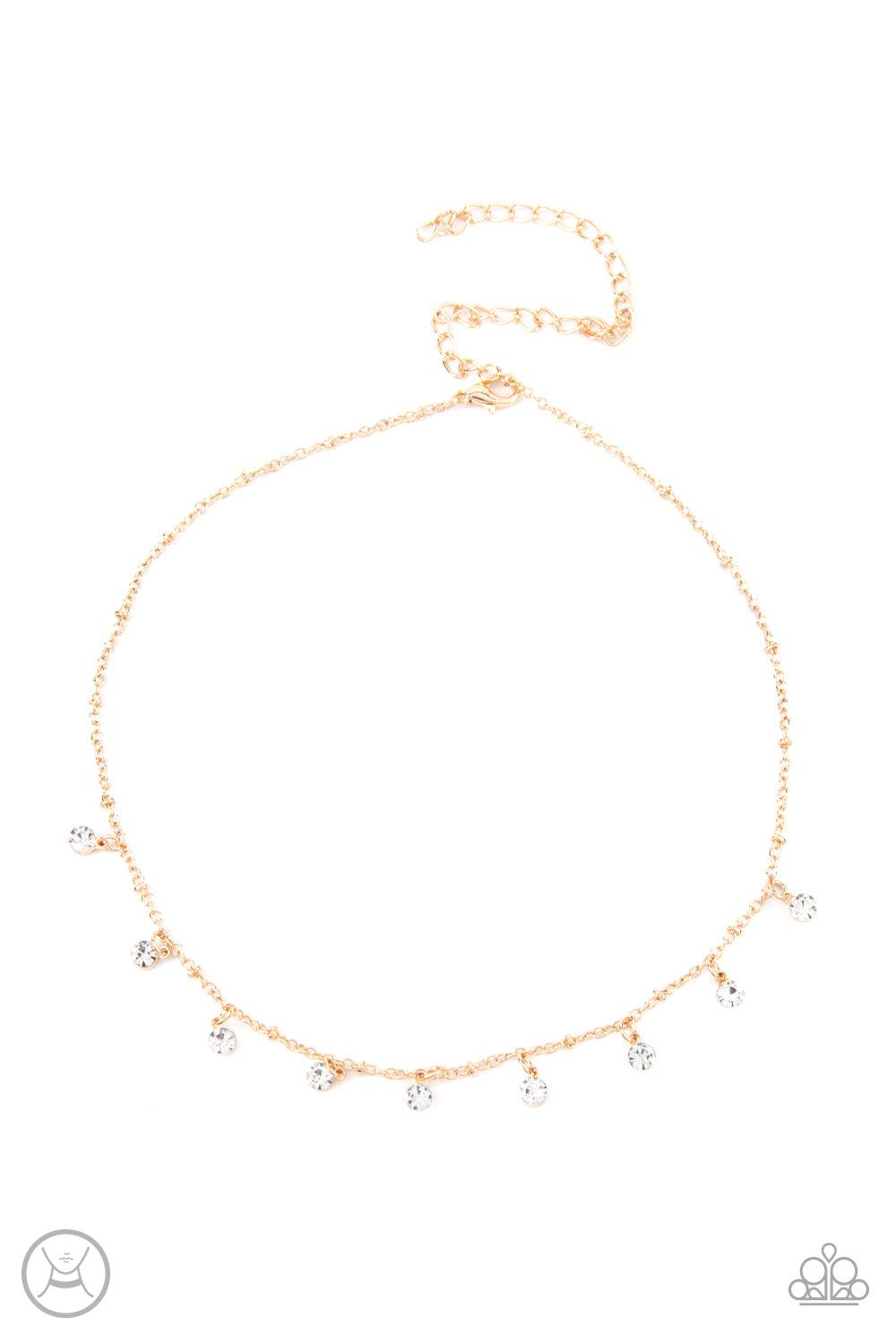 Paparazzi Accessories Dainty Diva - Gold Glassy white rhinestones swing from a dainty gold chain, creating a glamorous fringe around the neck. Features an adjustable clasp closure. Sold as one individual choker necklace. Includes one pair of matching earr