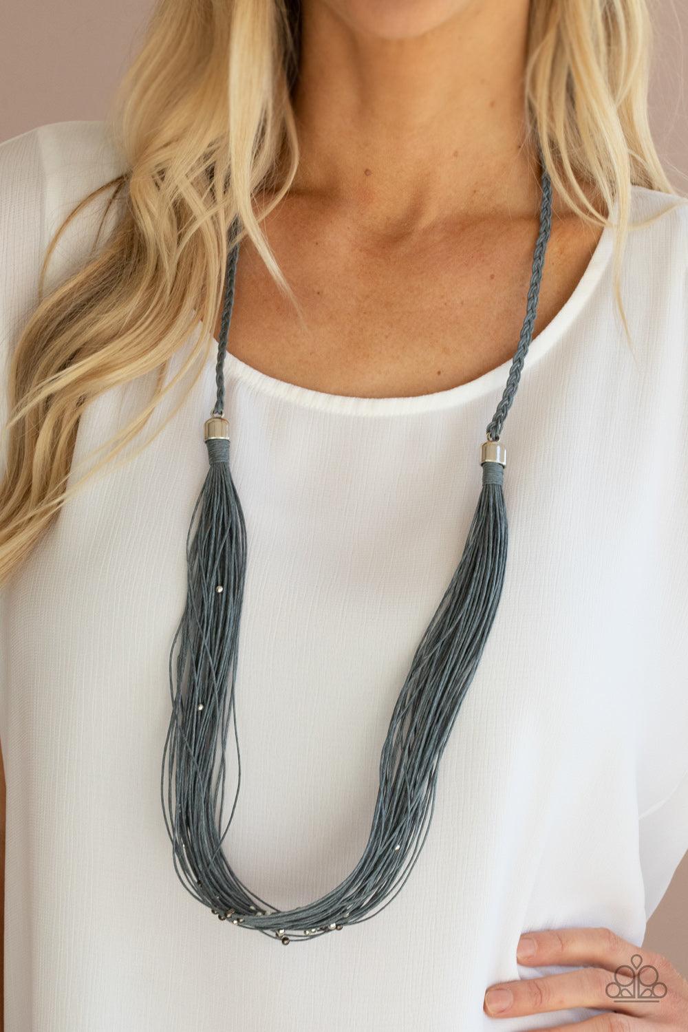 Paparazzi Accessories Homespun Artisan - Silver Speckled with dainty silver and gunmetal beads, rows of gray twine-like cording are knotted in place below two silver fittings that attach to a braided row of matching cording. The earthy display drapes acro
