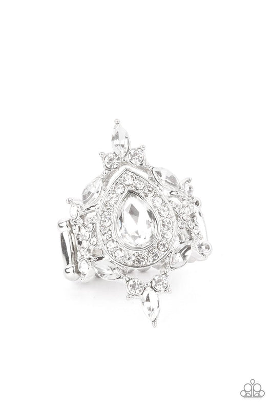 Paparazzi Accessories Mega Stardom - White Featuring classic round and regal marquise cuts, dainty white rhinestones delicately join into a stellar frame. Encrusted in glassy white rhinestones, an oversized teardrop gem sits atop the center of a sparkly b
