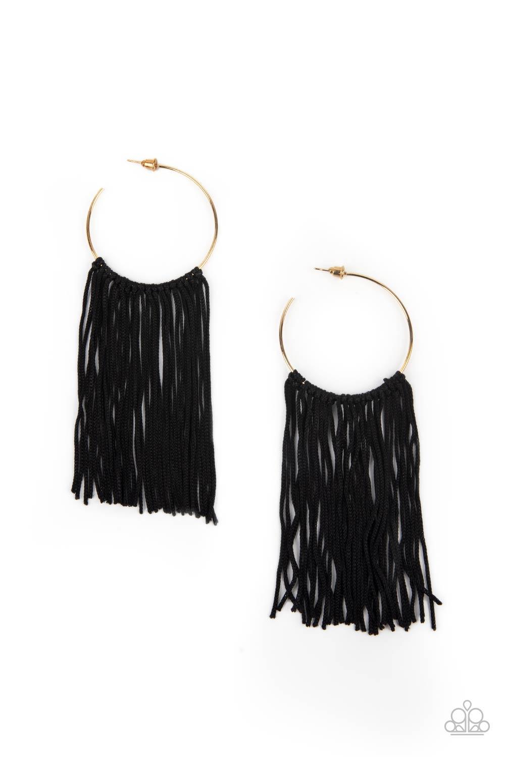 Paparazzi Accessories Flauntable Fringe - Gold A curtain of black cords stream from the center of a dainty gold hoop, creating a glamorous fringe. Earring attaches to a standard post fitting. Hoop measures approximately 1 3/4" in diameter. Sold as one pai