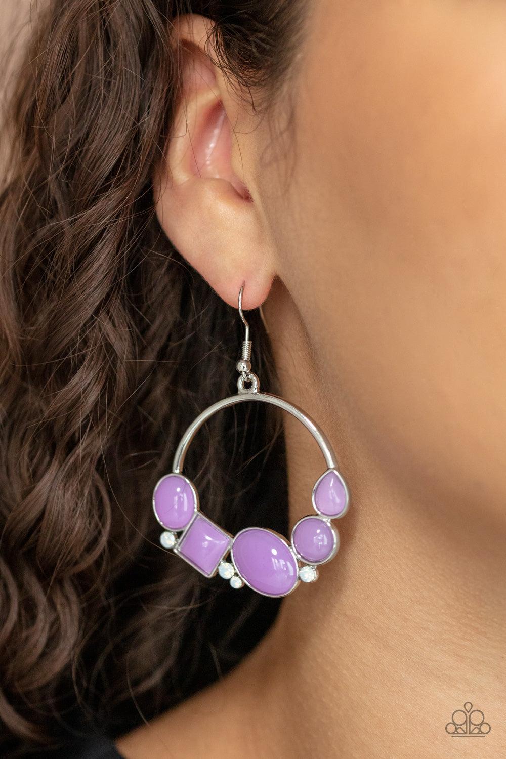 Paparazzi Accessories Beautifully Bubblicious - Purple Dainty opalescent white rhinestones are sprinkled between dewy oval, square, and circular purple beads along the bottom of a silver hoop, creating a bubbly pop of color. Earring attaches to a standard