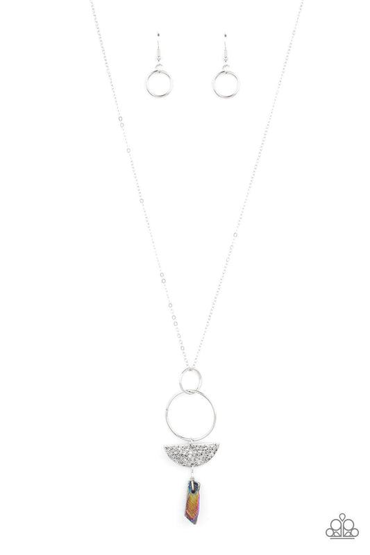 Paparazzi Accessories Monumental Obelisk - Multi Silver hoops, a slice of textured semi-circle disc, and a hammered multicolored stone-like obelisk pendant all dangle from a long chain for a trend-setting combination. Features an adjustable clasp closure.