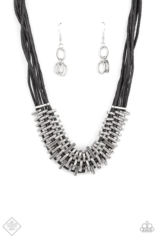 Paparazzi Accessories Lock, Stock, and SPARKLE - Black Bold and unapologetic, this hefty necklace gives off a hand-made feel with its multiple strands of black cording held together by industrial silver fittings that shift and slide. Features an adjustabl