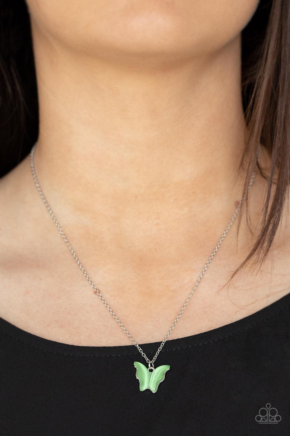 Paparazzi Accessories Butterfly Prairies - Green Infused with glistening green cat's eye stone wings, a shiny silver butterfly pendant swings from a dainty silver chain below the collar for a whimsy flair. Features an adjustable clasp closure. Sold as one