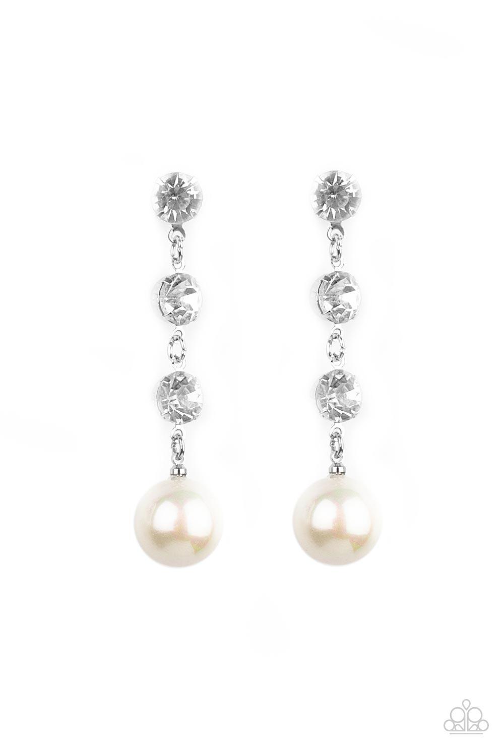 Paparazzi Accessories Yacht Scene - White Encased in sleek silver fittings, a trio of classic white rhinestones give way to an oversized iridescent pearl, creating an elegantly extended chandelier. Earring attaches to a standard post fitting. Sold as one