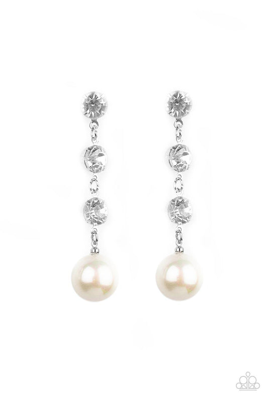 Paparazzi Accessories Yacht Scene - White Encased in sleek silver fittings, a trio of classic white rhinestones give way to an oversized iridescent pearl, creating an elegantly extended chandelier. Earring attaches to a standard post fitting. Sold as one