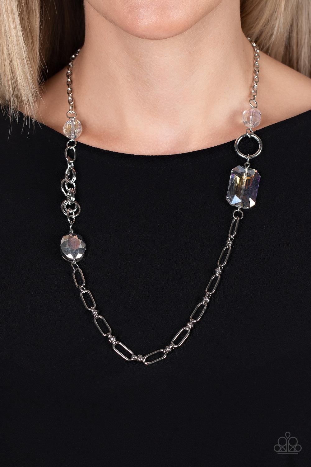 Paparazzi Accessories Famous and Fabulous - Multi A mismatched assortment of oval, round, textured, and silver hoops haphazardly link into a chaotic chain below the collar. Featuring oval and emerald style cuts, oversized white and iridescent gems sporadi