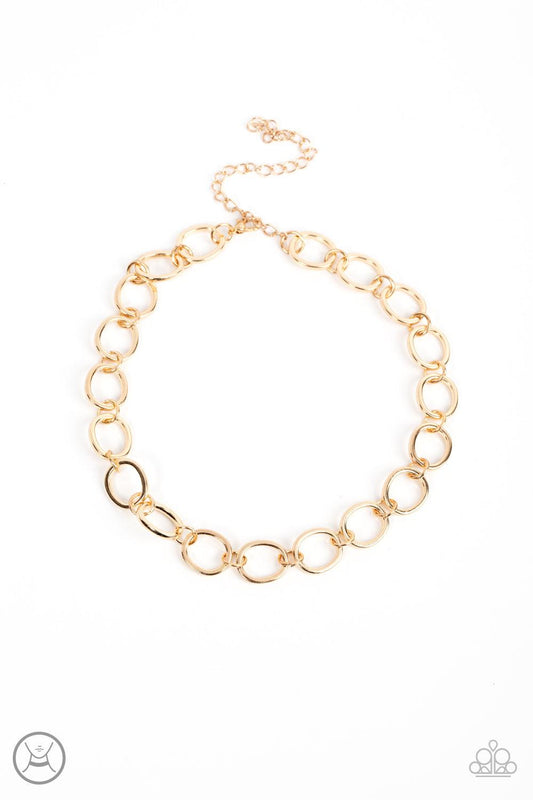Paparazzi Accessories 90s Nostalgia - Gold Imperfectly shaped gold circles link together around the neck for a gritty industrial statement. Features an adjustable clasp closure. Sold as one individual choker necklace. Includes one pair of matching earring