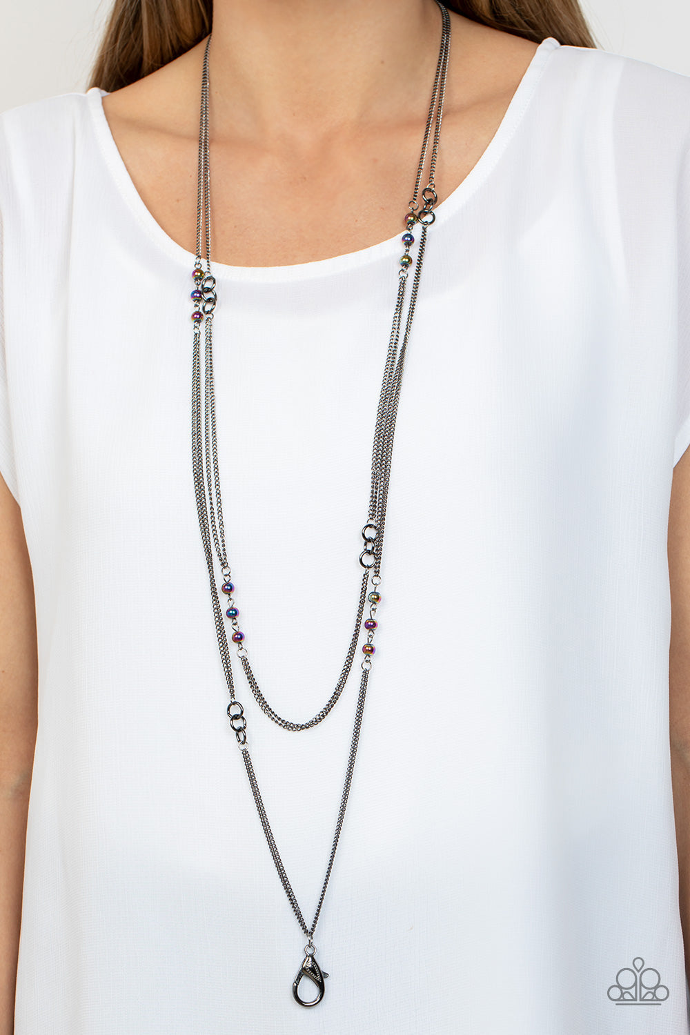 Paparazzi Accessories Ethereal Expectations - Multi Sections of metallic oil spill beads join trios of dainty gunmetal links along trestles of lengthened gunmetal chain that dramatically layer down the chest for an otherworldly effect. A lobster clasp han