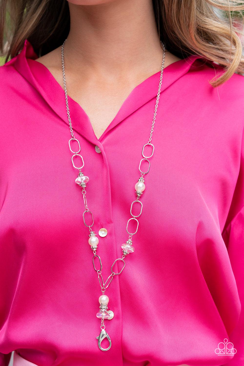 Paparazzi Accessories Creative Couture - White *Lanyard Infused with faceted and studded silver accents, iridescent beads and oversized white pearls connect with sections of oversized silver hoops across the chest for a refined flair. A lobster clasp hang
