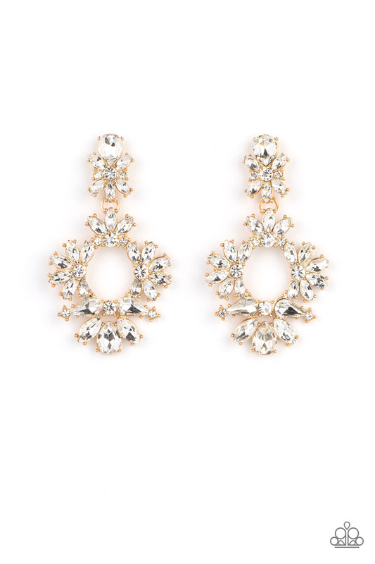 Paparazzi Accessories Leave them Speechless - Gold Ablaze with a mismatched assortment of brilliant white rhinestones, a stunning gold wreath swings from the bottom of a dainty white rhinestone fitting for a jaw-dropping dazzle. Earring attaches to a stan