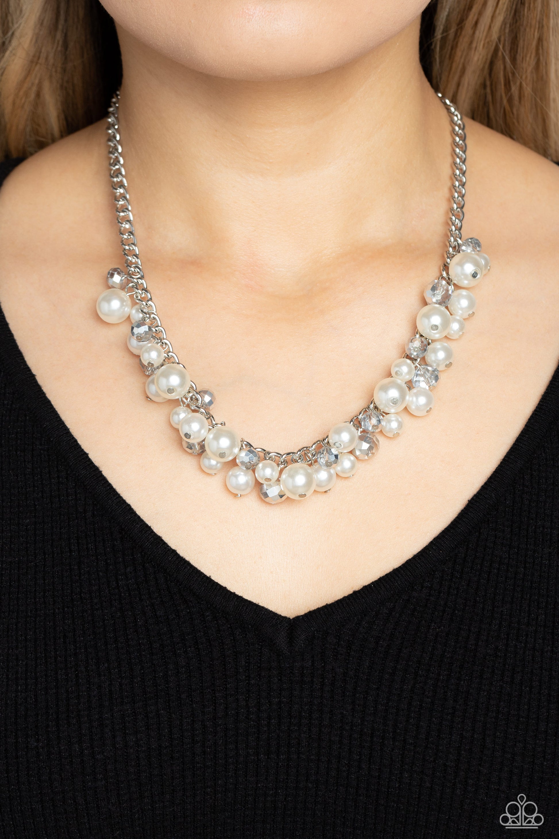 Paparazzi Accessories Glinting Goddess - Silver A faceted collection of glassy, silver crystal-like beads and classic white pearls in varying sizes flickers and flashes below the collar on a thick silver curb chain for a refined shimmer. Features an adjus