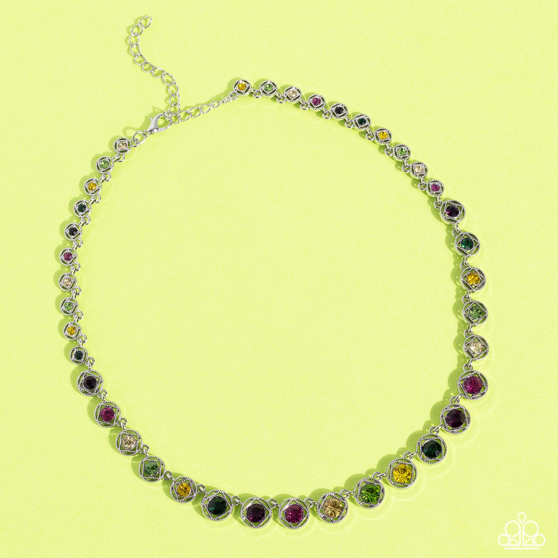 Paparazzi Accessories Kaleidoscope Charm - Multi Spanning around the entirety of the neckline, a refined collection of colorful rhinestones are pressed into airy, studded, silver square frames, tilted on their sides for a three-dimensional shimmer. The fr