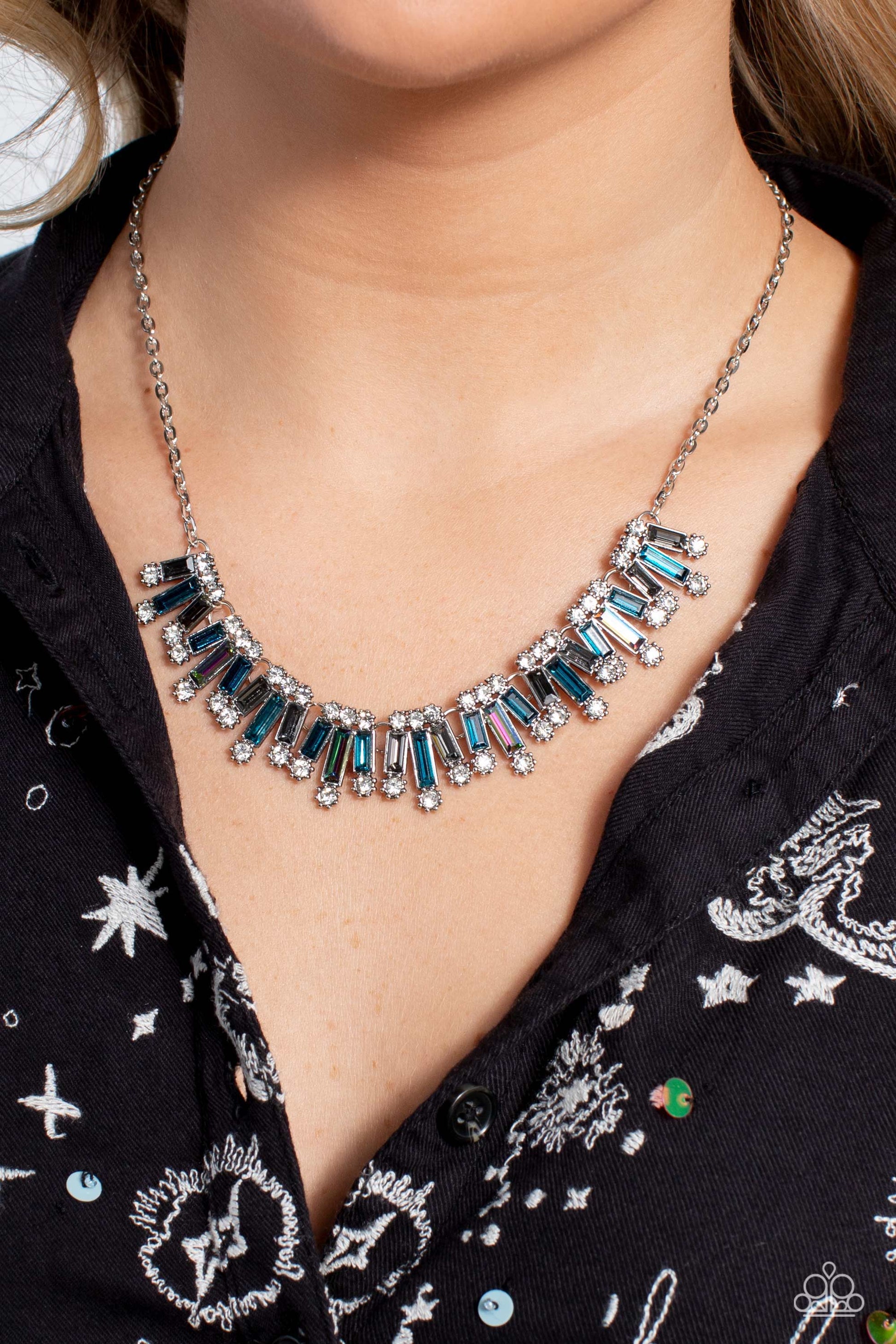 Paparazzi Accessories Sunburst Season - Multi Set in clusters around the neckline, a collection of shiny multicolored bars with a reflective finish glimmer. Dainty white gems, pressed into silver sun-studded frames, border the tops and bottoms of the colo