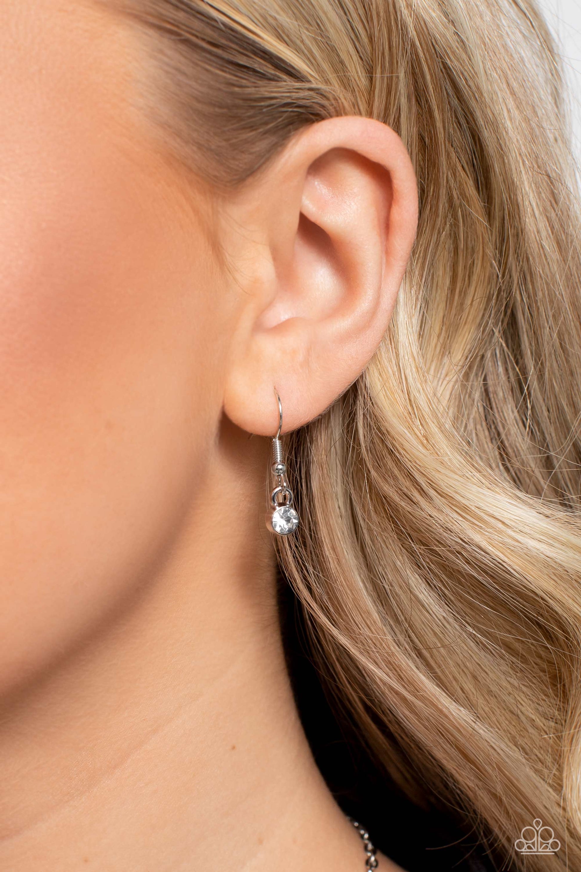 Paparazzi Accessories Sunburst Season - Multi Set in clusters around the neckline, a collection of shiny multicolored bars with a reflective finish glimmer. Dainty white gems, pressed into silver sun-studded frames, border the tops and bottoms of the colo