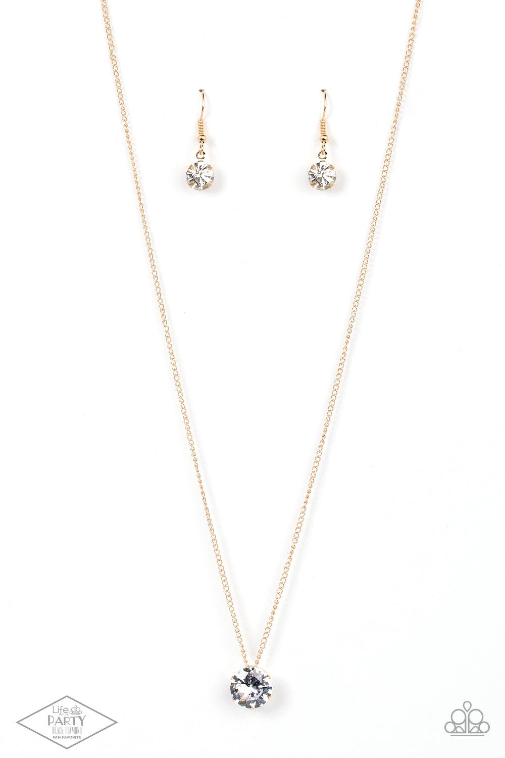 Paparazzi Accessories What A Gem - Gold A single rhinestone sparkles brilliantly at the bottom of a dainty gold chain, creating a stunning solitaire design. Features an adjustable clasp closure. Sold as one individual necklace. Includes one pair of matchi